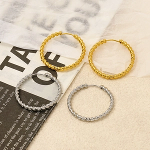 Minimalist twisted rope hoop earrings in gold and silver polished stainless steel finish