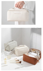 Detailed interior view of striped cosmetic bag showing spacious compartments and storage