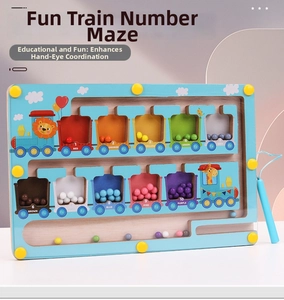 Detail of wooden magnetic maze showing train carriages with numbered color beads and stylus