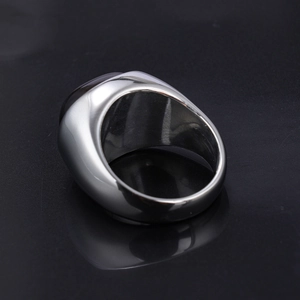 Men's wide stainless steel ring featuring a polished silver finish and tiger eye stone