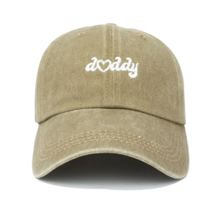 Detail of khaki washed cotton baseball cap with white Daddy heart embroidery