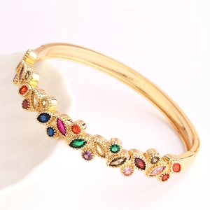 Macro detail of 18K gold plated bracelet featuring multi-colored marquise cut zircons