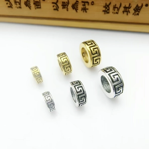 Tibetan silver Greek key spacers in gold and silver finish, multiple sizes on white background