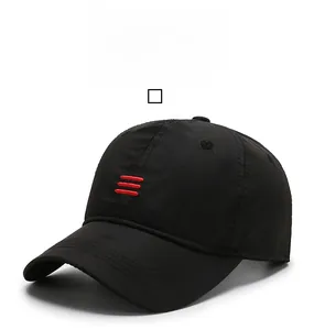 Detail of black quick-dry baseball cap featuring breathable mesh and red stripe embroidery