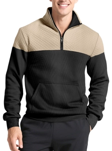 Detail of men's quarter-zip polo shirt showing khaki quilted texture and black ribbed fabric