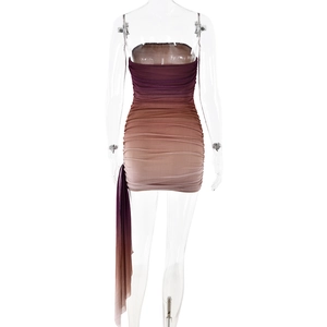 Rear view of ruched bodycon dress with gradient purple to nude tones and flowing ribbon