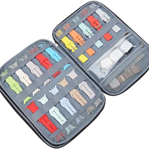 Gray zip-up watch band organizer bag with multiple slots for silicone straps and cases