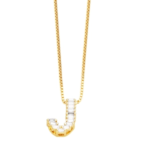 Detail of gold box chain necklace featuring a zircon-encrusted letter J pendant