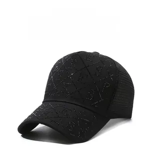 Close-up of black breathable mesh baseball cap with sparkling rhinestone diamond pattern
