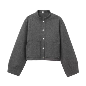 Detailed view of dark grey wool bomber jacket with stand collar and metallic buttons