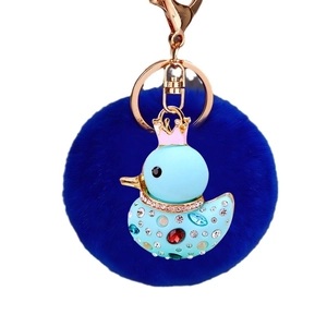 Cute blue plush duck keychain with crown and sparkling rhinestones for handbags