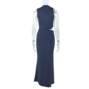 Detail of dark blue knit maxi dress featuring a stylish back cutout and slim fit