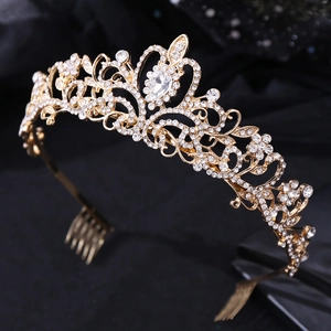 Luxurious bridal crown with gold plating and sparkling crystals on elegant floral patterns