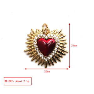 Detail showing dimensions of red enamel heart charm with arrow and crystals