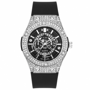 Luxury women's quartz watch with silver rhinestone bezel and black silicone strap