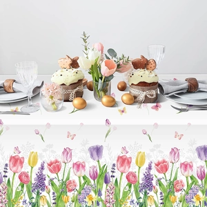Detail of vintage watercolor tulip and butterfly print on a white disposable party tablecloth