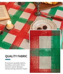 Detail of red and green plaid Christmas tablecloth showing heavy fabric texture and weave