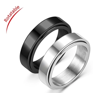 Rotatable stainless steel rings in black and silver finishes with brushed inner band