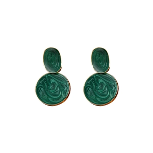 Elegant gold-rimmed dark green marble texture geometric earrings on white background
