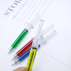 Syringe-shaped ballpoint pens with 5ml scale markers in multiple vibrant colors