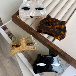 Cat shaped acetate hair claws in marble white, tortoiseshell, glitter and black set