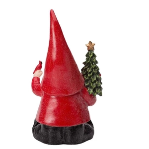 Back view of resin Christmas gnome figurine with red hat and a small bird on shoulder
