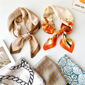 Elegant 70cm square silk scarf for women featuring premium geometric and floral patterns