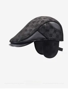 Detailed view of grey wool plaid textures and faux leather stitching on baseball cap