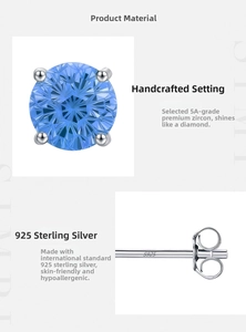 Macro detail of royal blue zircon stud earring with S925 sterling silver hallmark