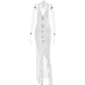 White halter neck maxi dress with 3D floral details and asymmetric ruffle slit hemline