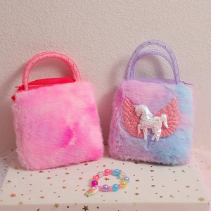 Close-up of plush unicorn handbags with sequin details and glitter handles for girls