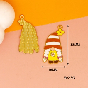 Detail view of gnome pendant charms with honeycomb motifs and 35mm height dimensions