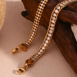 Gold plated triple layered woven chain bracelet with zircon stones and beads