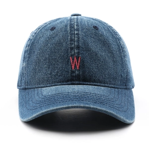 Classic blue denim baseball cap with red embroidered W letter and retro street style