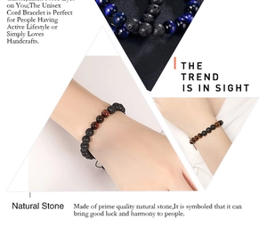Detail of 8mm tiger eye and lava stone beads on an adjustable braided bracelet