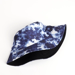 Close-up of tie-dye bucket hat with reinforced stitching and soft black inner lining