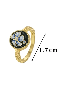 Detail of vintage lotus enamel ring with zircon inlay and 1.7 cm diameter size mark