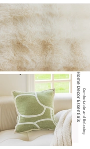 Macro detail of plush beige texture and green patterned throw pillow for home decor
