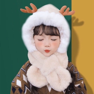 Cute beige plush baby earflap hat with brown reindeer antlers and integrated scarf