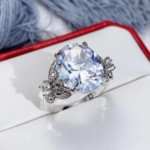 Macro view of S925 silver ring featuring a large oval cubic zirconia and hollow textures