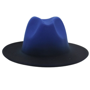 Detailed close-up of a two-tone gradient fedora hat in royal blue and black wool felt