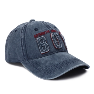 Washed denim baseball cap featuring vintage BOY patches and authentic urban embroidery