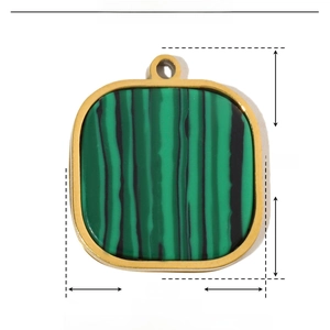 Macro view of geometric fan pendant with green natural stone in gold stainless steel
