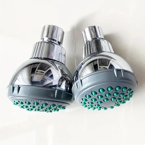 Water-saving chrome shower head with green nozzles, model A112.18.1M, 80PSI pressure