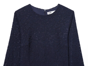 Detail view of navy lace midi dress featuring floral patterns and a hidden back zipper