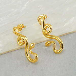 Golden stainless steel snake earrings in minimalist French style on a textured background