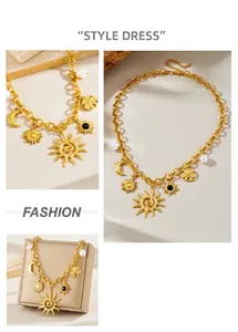 Détail d'un collier céleste plaqué or avec breloques soleil lune et perles blanches