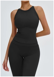 Detail of cross back cut-out design on a moisture-wicking black athletic yoga vest