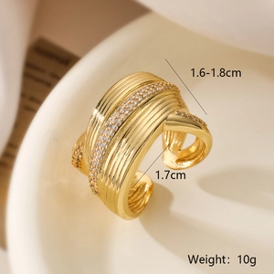 Macro shot of gold-plated geometric ring with zircon stones showing width and diameter
