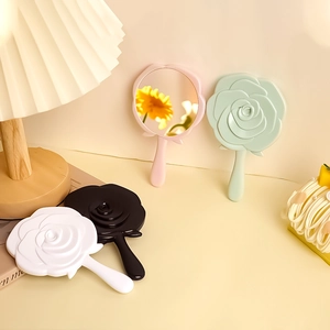 Mini rose shaped handheld mirrors in pink mint green white and black portable design